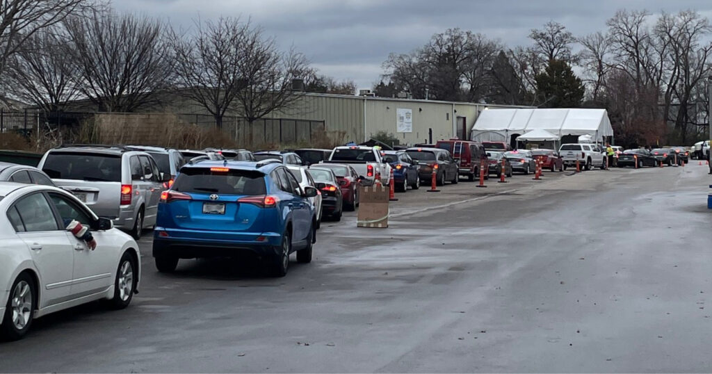 Long line of cars at The River Food Pantry